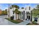 Stunning modern home exterior with beautiful palm trees at 3860 Hildebrand Ln, Las Vegas, NV 89121