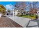 Long driveway leading to the home, surrounded by lush greenery at 3860 Hildebrand Ln, Las Vegas, NV 89121