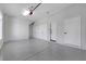A spacious garage with epoxy flooring and plenty of room for storage and vehicles at 3860 Hildebrand Ln, Las Vegas, NV 89121