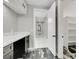 Bright hallway with luxury flooring, and a convenient storage area, offering both style and functionality at 3860 Hildebrand Ln, Las Vegas, NV 89121