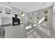 Inviting living room features an open layout with a fireplace, modern finishes, and bright lighting at 3860 Hildebrand Ln, Las Vegas, NV 89121