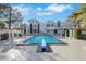 Home with large inground pool, diving board and a spacious stamped concrete patio at 3860 Hildebrand Ln, Las Vegas, NV 89121