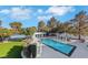 Private backyard oasis includes pool and tennis court at 3860 Hildebrand Ln, Las Vegas, NV 89121