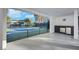 An entertainment space with outdoor kitchen area overlooking tennis and basketball court at 3860 Hildebrand Ln, Las Vegas, NV 89121