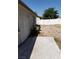 A backyard with a patio and block fence offers privacy for outdoor enjoyment at 3908 Montebello Ave, Las Vegas, NV 89110