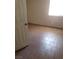 Bedroom featuring tile flooring, neutral walls, and natural light at 3908 Montebello Ave, Las Vegas, NV 89110