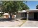 Image of home's exterior with trees and simple landscaping at 3908 Montebello Ave, Las Vegas, NV 89110