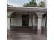 Charming front entrance with covered porch and stylish architectural details at 3908 Montebello Ave, Las Vegas, NV 89110