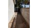 A side yard featuring a block wall fence and potential for landscaping at 3908 Montebello Ave, Las Vegas, NV 89110