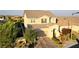 Aerial view of a two-story home with a well-manicured lawn and brick driveway at 426 Port Reggio St, Las Vegas, NV 89138