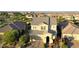 Aerial view of a two-story home with a well-manicured lawn and brick driveway at 426 Port Reggio St, Las Vegas, NV 89138