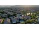 High aerial view of the house highlighting the pool, landscaping, houses and mountain views at 426 Port Reggio St, Las Vegas, NV 89138