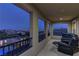 Covered balcony offering beautiful city views with comfortable seating at 426 Port Reggio St, Las Vegas, NV 89138