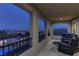 Covered balcony features seating area with mountain and city views at 426 Port Reggio St, Las Vegas, NV 89138