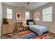 Charming bedroom with colorful decor, playful accents, and cozy furnishings, creating a fun and inviting space at 426 Port Reggio St, Las Vegas, NV 89138