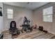 Bright bonus room with exercise equipment and laminate wood flooring at 426 Port Reggio St, Las Vegas, NV 89138