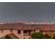 Enjoy breathtaking city views from this home, enhanced by a terracotta tile roof and neutral stucco exterior at 426 Port Reggio St, Las Vegas, NV 89138