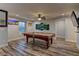 Spacious game room featuring a pool table and decorative artwork at 426 Port Reggio St, Las Vegas, NV 89138
