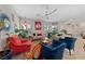 Bright living room showcasing modern decor, stylish furniture, and colorful accents, enhanced by natural light at 4514 Sapphire Moon Ave, North Las Vegas, NV 89084