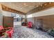 Outdoor patio featuring brick flooring, fenced-in yard, seating, and string lights at 4514 Sapphire Moon Ave, North Las Vegas, NV 89084