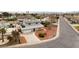 Home with a large driveway, solar panels, and well-maintained landscaping at 4690 San Benito St, Las Vegas, NV 89121