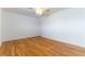 Bright bedroom featuring a ceiling fan and wood floors at 4690 San Benito St, Las Vegas, NV 89121