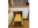 Pull out shelves inside of a kitchen cabinet at 4690 San Benito St, Las Vegas, NV 89121
