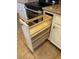 Kitchen cabinet pull out shelving beside a stainless steel oven at 4690 San Benito St, Las Vegas, NV 89121