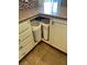 Pull out trash cans inside of a kitchen cabinet at 4690 San Benito St, Las Vegas, NV 89121