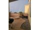 Back patio featuring a stone design with an outdoor barbecue area and space to relax at 4900 Whisper Lake Ave, Las Vegas, NV 89131