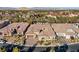 An aerial view of homes in a picturesque community with neatly manicured landscaping at 50 Carolina Cherry Dr, Las Vegas, NV 89141