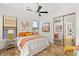 Comfortable bedroom with a mirrored closet and stylish decor at 50 Carolina Cherry Dr, Las Vegas, NV 89141