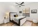 Cozy bedroom with a stylish bed frame and a comfortable rug at 50 Carolina Cherry Dr, Las Vegas, NV 89141