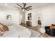 Well lit bedroom with plush carpet and a view to the en suite bathroom at 50 Carolina Cherry Dr, Las Vegas, NV 89141