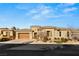 Beautiful single story home featuring manicured landscaping, neutral color palette, and tile roof at 50 Carolina Cherry Dr, Las Vegas, NV 89141