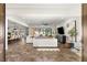 Open-concept living area with an airy feel, featuring stone floors, and modern decor at 50 Carolina Cherry Dr, Las Vegas, NV 89141