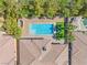 Overhead shot of a backyard featuring a refreshing pool and desert landscaping at 50 Carolina Cherry Dr, Las Vegas, NV 89141