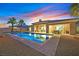 Sparkling pool with desert landscaping, an outdoor patio, and an eating area at 50 Carolina Cherry Dr, Las Vegas, NV 89141