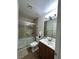Bathroom featuring a shower with glass doors, a toilet, and vanity at 5044 S Rainbow Blvd # 106, Las Vegas, NV 89118