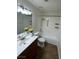 Well-lit bathroom featuring a vanity, mirror, and shower/tub combo at 5044 S Rainbow Blvd # 106, Las Vegas, NV 89118