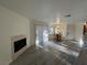 Bright living space with fireplace, natural light, and dining area at 5044 S Rainbow Blvd # 106, Las Vegas, NV 89118