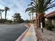 View of community street showcasing mature trees and landscaped common areas at 5044 S Rainbow Blvd # 106, Las Vegas, NV 89118
