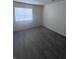 Bedroom featuring a window and vinyl flooring at 5115 Blossom Ave, Las Vegas, NV 89142