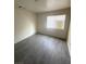 Bedroom featuring a window and vinyl flooring at 5115 Blossom Ave, Las Vegas, NV 89142