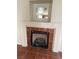 Cozy living room fireplace with tiled surround and mantel at 5115 Blossom Ave, Las Vegas, NV 89142
