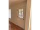 Front door with decorative glass inset panel and tiled flooring at 5115 Blossom Ave, Las Vegas, NV 89142