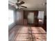 Eat-in kitchen with tile flooring, neutral paint, breakfast bar, and lots of cabinet space at 5115 Blossom Ave, Las Vegas, NV 89142