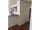 Open kitchen layout with tile floors, tiled backsplash, and a breakfast bar at 5115 Blossom Ave, Las Vegas, NV 89142