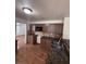 Kitchen featuring granite countertops, stainless steel sink, and tiled backsplash at 5115 Blossom Ave, Las Vegas, NV 89142