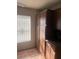 Kitchen nook with a built-in pantry, granite countertops, and window at 5115 Blossom Ave, Las Vegas, NV 89142